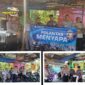 Foto : Satlantas) Polres Demak berbagi nasi kotak kepada para tukang ojek di kompleks Terminal Bintoro Kabupaten Demak