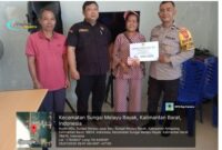 Foto : Kapolsek Tumbang Titi melalui Bhabinkamtibmas, melaksanakan pendampingan penyaluran Bantuan Langsung Tunai (BLT)
