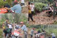 Foto : Babinsa 14 Hulu Gurung Bersama Petani Atasi Hambatan Hand Traktor Areal Persawahan