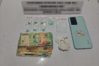 Foto : Polres HSU Tangkap Dua Pengedar di Tengah Malam, Sita 7 Butir Ekstasi Berlogo Tengkorak